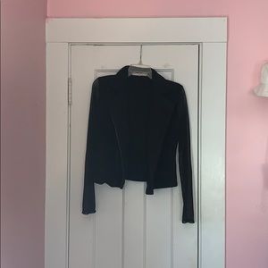 Lightweight jacket with sheer sleeves.